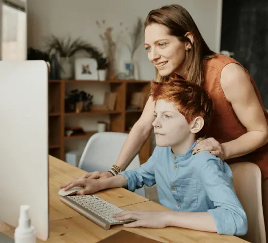 kid learning hindi and english with his mom